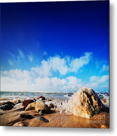 Wave Metal Print featuring the photograph Waves hiting rocks on the sunny beach by Michal Bednarek