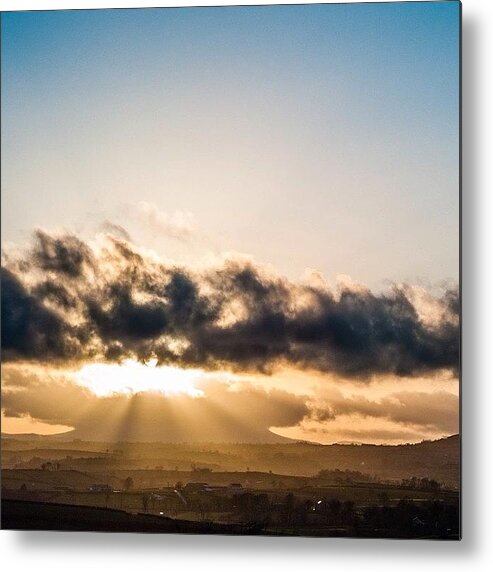 Golden Metal Print featuring the photograph Where The Sun Sets In A Golden Glow by Aleck Cartwright