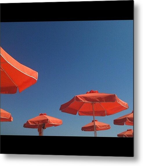 Summer Metal Print featuring the photograph #beach #umbrella #ialyssos #orange #sky by Nicole Parkes