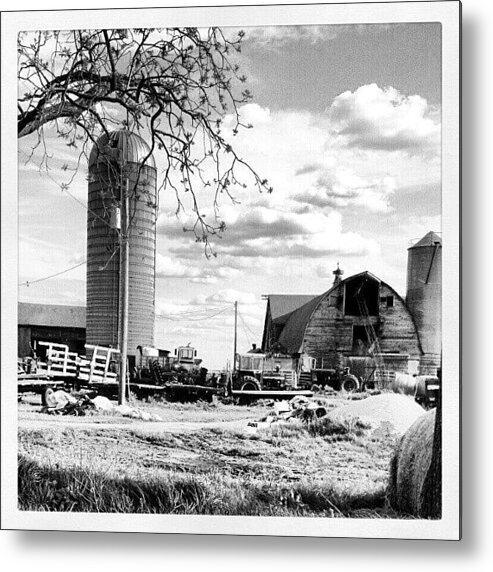 Blackandwhite Metal Print featuring the photograph #farm #barn #tractor #cloud by Bryan P