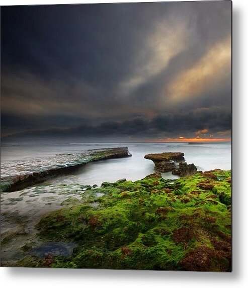  Metal Print featuring the photograph Long Exposure Of A Stormy Sunset At A by Larry Marshall