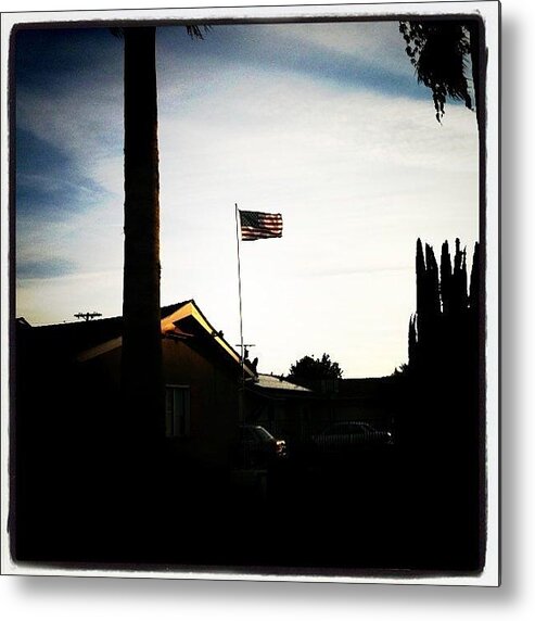  Metal Print featuring the photograph Old Glory Flying In The Wind by Jose Callejas