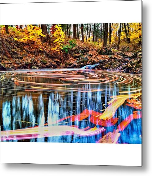 Leaf Metal Print featuring the photograph Leaves Swirl Quuckly on a Woodland Pond by Blake Butler