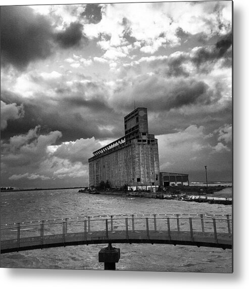 Beautiful Metal Print featuring the photograph Does Anyone Know Why This Pier Has Been by Kevin Rybczynski