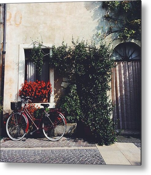 Building Metal Print featuring the photograph #facade #building #lazise #italy by Michelle Olaya