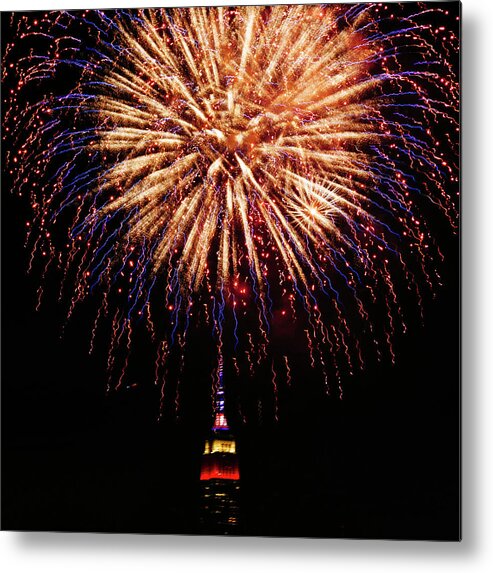 New York Metal Print featuring the photograph Fireworks Over Empire State Building by Laura Tucker