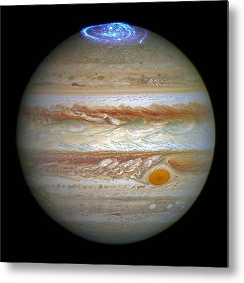 Jupiter Metal Print featuring the photograph Hubble Captures Vivid Auroras in Jupiter's Atmosphere by Eric Glaser