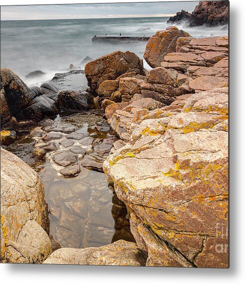 Sunset Metal Print featuring the photograph Stormy rock beach by Sophie McAulay