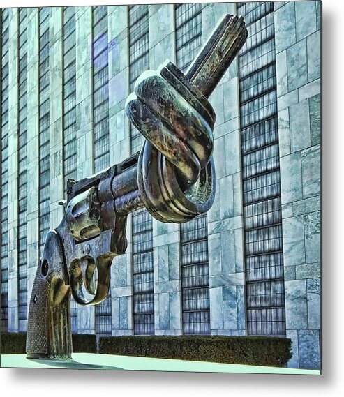 Non-violence Sculpture Metal Print featuring the photograph The Knotted Gun by Allen Beatty