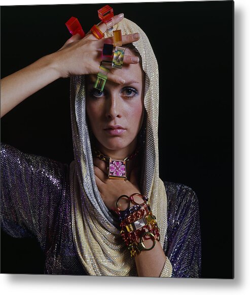 Fashion Metal Print featuring the photograph Twiggy with Lucite Rings by Bert Stern