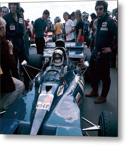 Crash Helmet Metal Print featuring the photograph Jackie Stewart At The Wheel Of A Racing #1 by Heritage Images