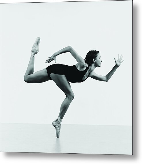 Expertise Metal Print featuring the photograph Ballerina Standing On Tiptoe by Chris Nash