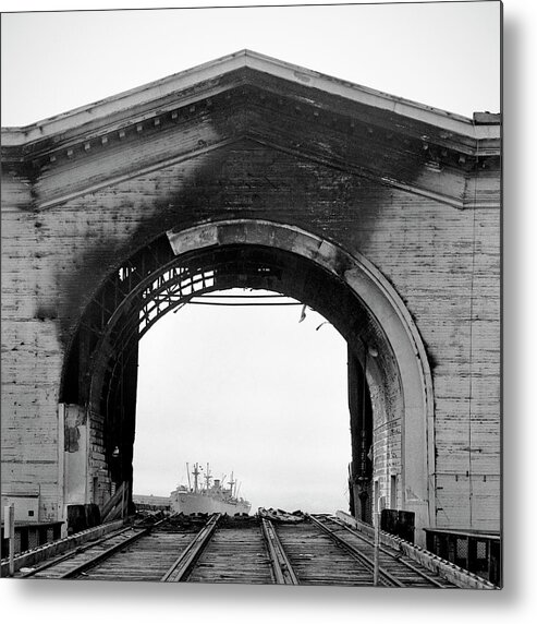 Arch Metal Print featuring the photograph Burned Arch Over Railroad Tracks by Studio 642