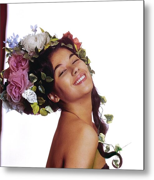 Actress Metal Print featuring the photograph France Nuyen In A Flower Headdress by Bert Stern