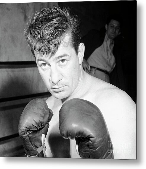 Fist Metal Print featuring the photograph Middleweight Boxer Rocky Graziano by Bettmann