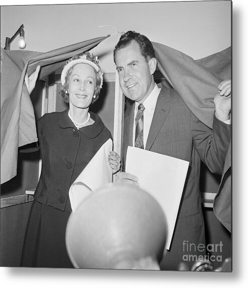 People Metal Print featuring the photograph Pat And Richard Nixon At Voting Booth by Bettmann
