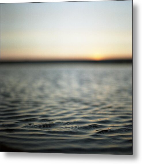 Tranquility Metal Print featuring the photograph Ripples On Water At Sunset by Elizabeth Moehlmann