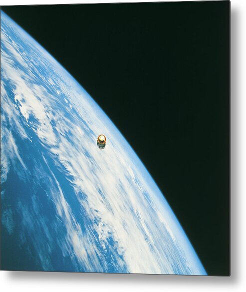 Galaxy Metal Print featuring the photograph Satellite In Orbit Around The Earth by Stockbyte