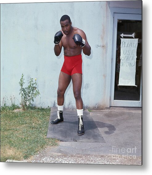 Event Metal Print featuring the photograph Sonny Liston Practicing Outdoors by Bettmann