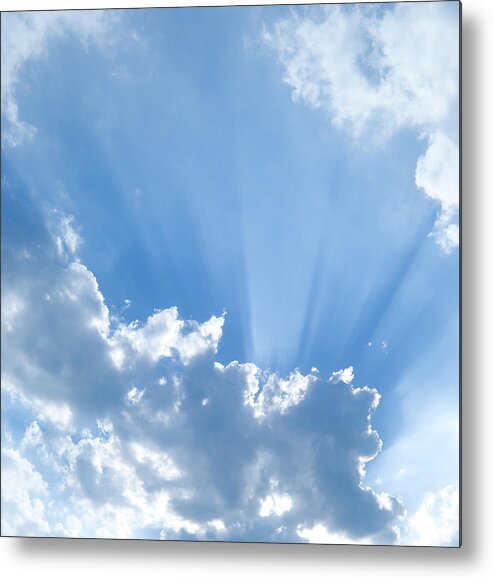 Scenics Metal Print featuring the photograph Sun Shining Through Puffy Clouds by Rtyree1