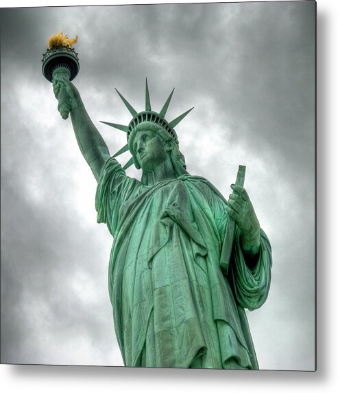 Statue Metal Print featuring the photograph The Statue Of Liberty Nyc Under A by Marcel Germain