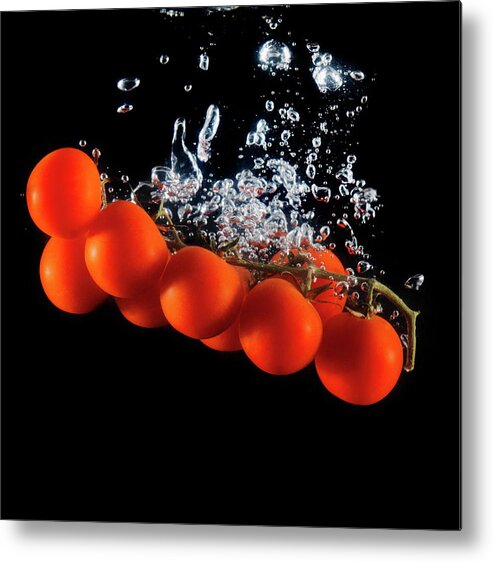 Black Background Metal Print featuring the photograph Tomatoes On The Vine Sinking Into Water by Henrik Sorensen
