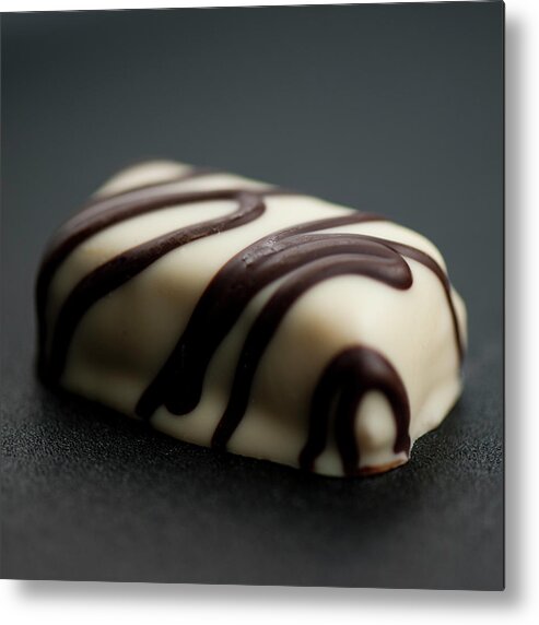 Unhealthy Eating Metal Print featuring the photograph White Chocolate Praline by Christina Børding