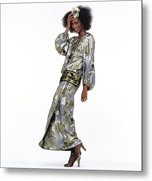 Fashion Metal Print featuring the photograph Beverly Johnson Wearing A Silver Saint Laurent Dress by Albert Watson