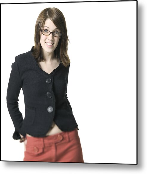 White Background Metal Print featuring the photograph Medium Shot Of A Young Adult Female In A Black Shirt And Glasses As She Smiles by Photodisc