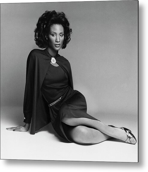 Accessories Metal Print featuring the photograph Model Beverly Johnson Wearing Adele Simpson Dress by Francesco Scavullo