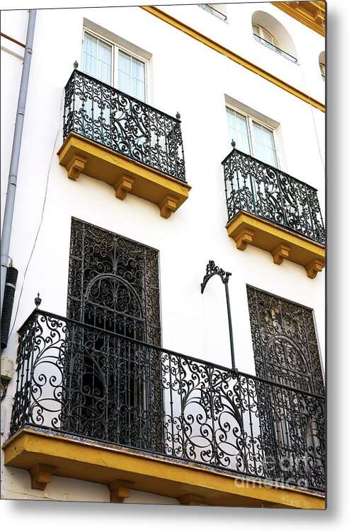 Wrought Iron Style In Seville Metal Print featuring the photograph Wrought Iron Style in Seville by John Rizzuto