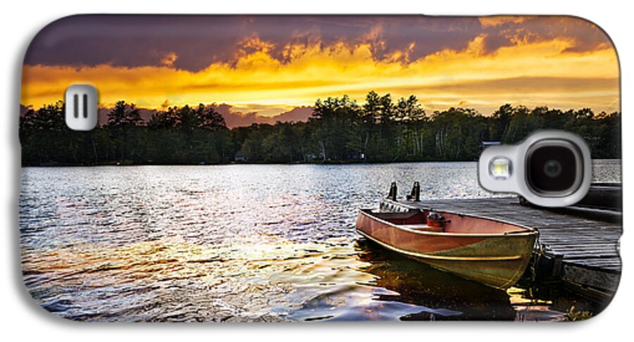 Boat Galaxy S4 Case featuring the photograph Boat on lake at sunset by Elena Elisseeva
