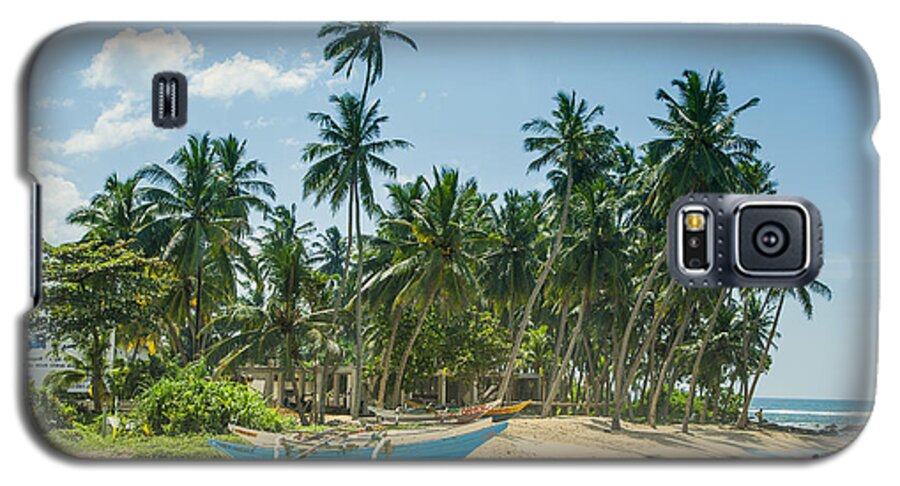 Catamaran Galaxy S5 Case featuring the photograph Blue Catamaran at a beach with coconut palm trees by Gina Koch