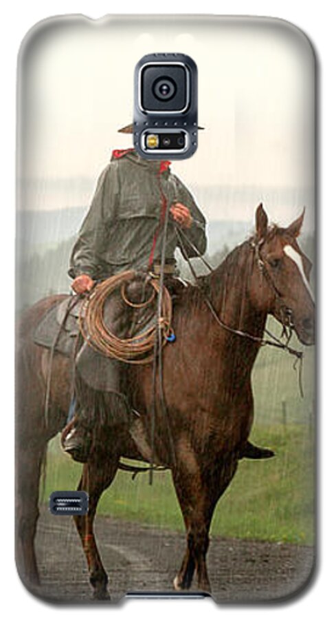 Cowboy Galaxy S5 Case featuring the photograph Braving the Rain by Todd Klassy