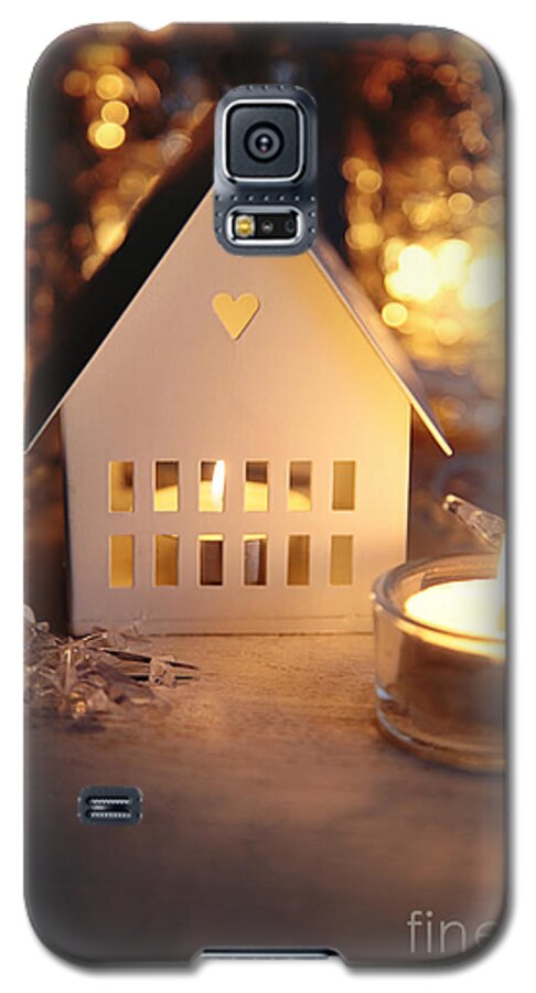 Bright Galaxy S5 Case featuring the photograph Little white house lit with candle for the holidays by Sandra Cunningham