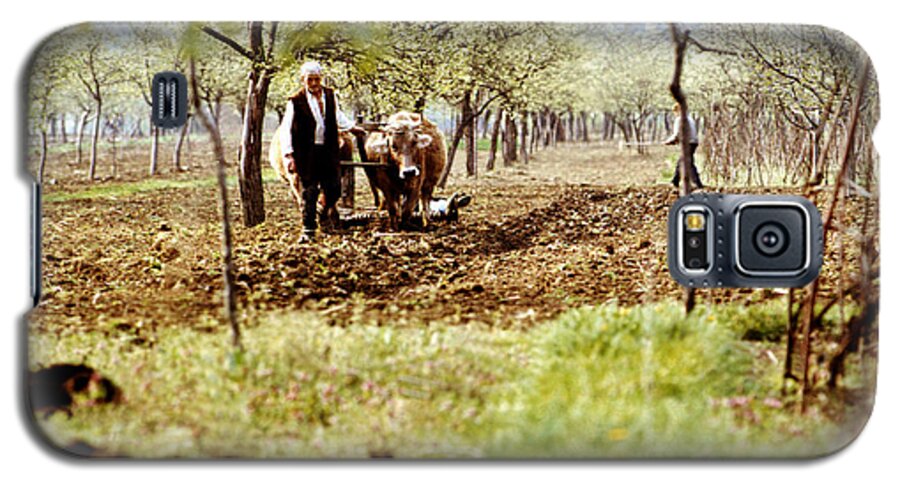 Agriculture Galaxy S5 Case featuring the photograph Ploughing in the orchard by Emanuel Tanjala