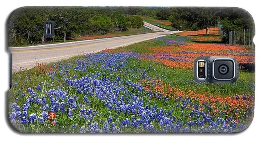 Texas Hill Country Galaxy S5 Case featuring the photograph Vibrant colorful scenic landscape of bluebonnets and Indian Pain by Dan Herron