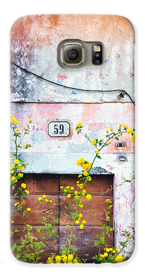 Architecture Galaxy S6 Case featuring the photograph Yellow flowers and decayed wall by Silvia Ganora