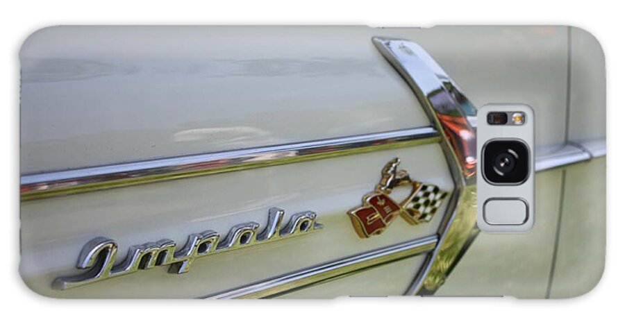 1960 Chevy Impala Emblem And Logo Galaxy Case featuring the photograph 1960 Chevy Impala Emblem and Logo by John Telfer