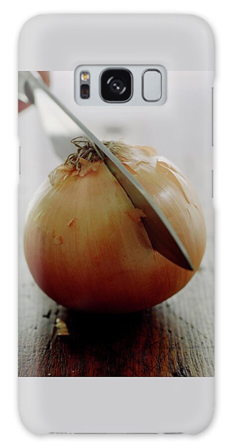 A Raw Onion Being Cut In Half Galaxy Case