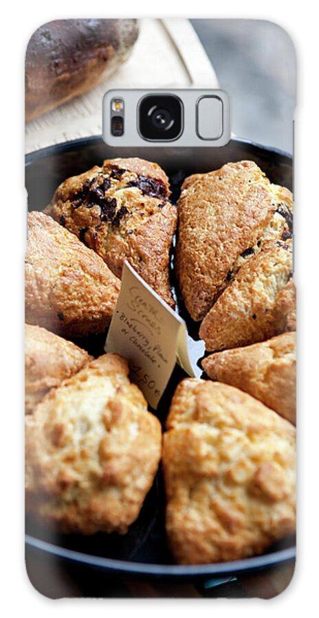 Breakfast Galaxy Case featuring the photograph A Variety Of Scones For Sale On Display by Halfdark