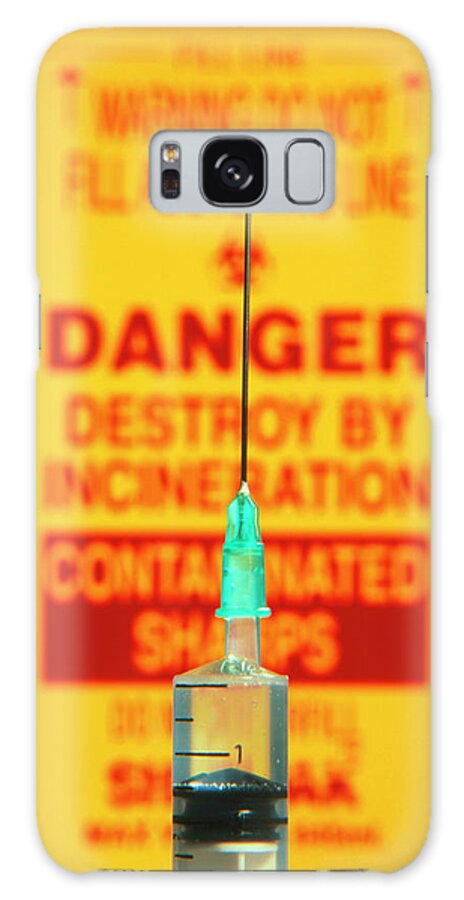 Syringe Galaxy Case featuring the photograph Close-up Of Syringe In Front Of Sharps Bin by Saturn Stills/science Photo Library