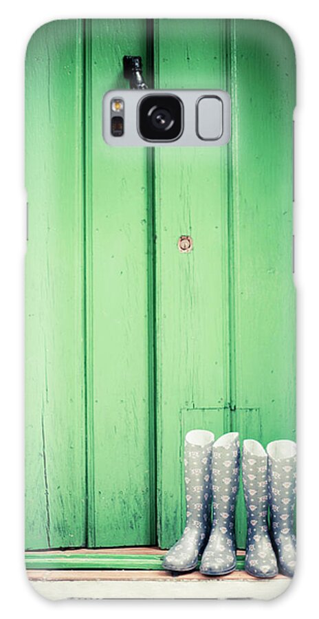 Outdoors Galaxy Case featuring the photograph Door With Boots by Pelayolacazette