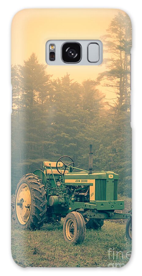 Tractor Galaxy Case featuring the photograph Early morning tractor in farm field by Edward Fielding