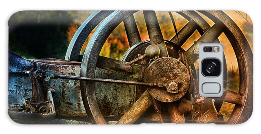 Wheels Galaxy Case featuring the photograph Fall Through the Wheels by Sue Capuano