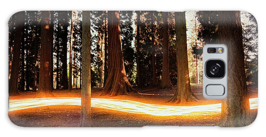 Kent Galaxy Case featuring the photograph Light Trail Passing Around Trees by Robert Decelis Ltd