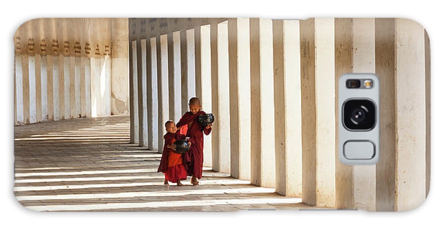 Asian And Indian Ethnicities Galaxy Case featuring the photograph Monks In Walkway To Shwezigon Pagoda by Peter Adams