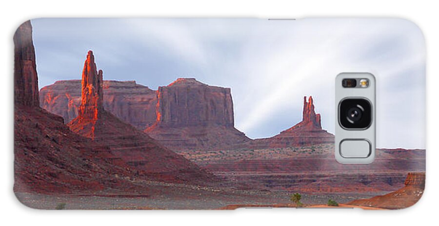 Desert Galaxy Case featuring the photograph Monument Valley at Sunset Panoramic by Mike McGlothlen