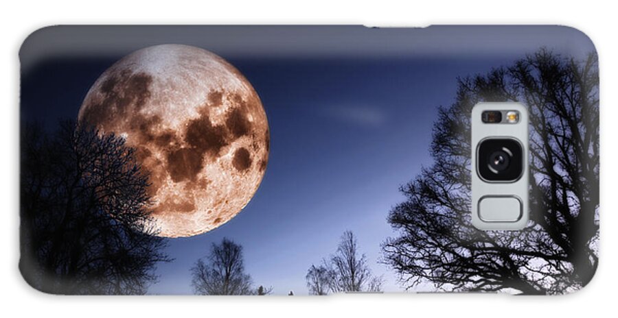 Moon Galaxy Case featuring the photograph Mysterious Full Moon Rising Over Forest by Christian Lagereek
