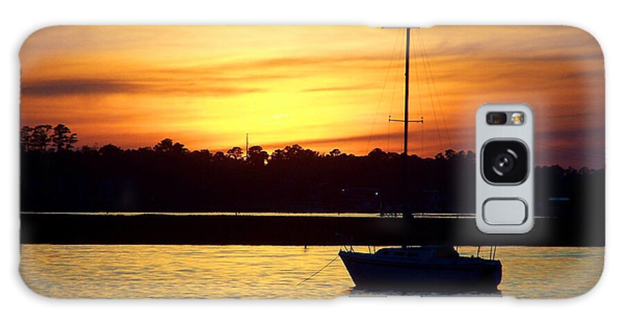 Sailboat Galaxy Case featuring the photograph Resting In A Mango Sunset by Sandi OReilly